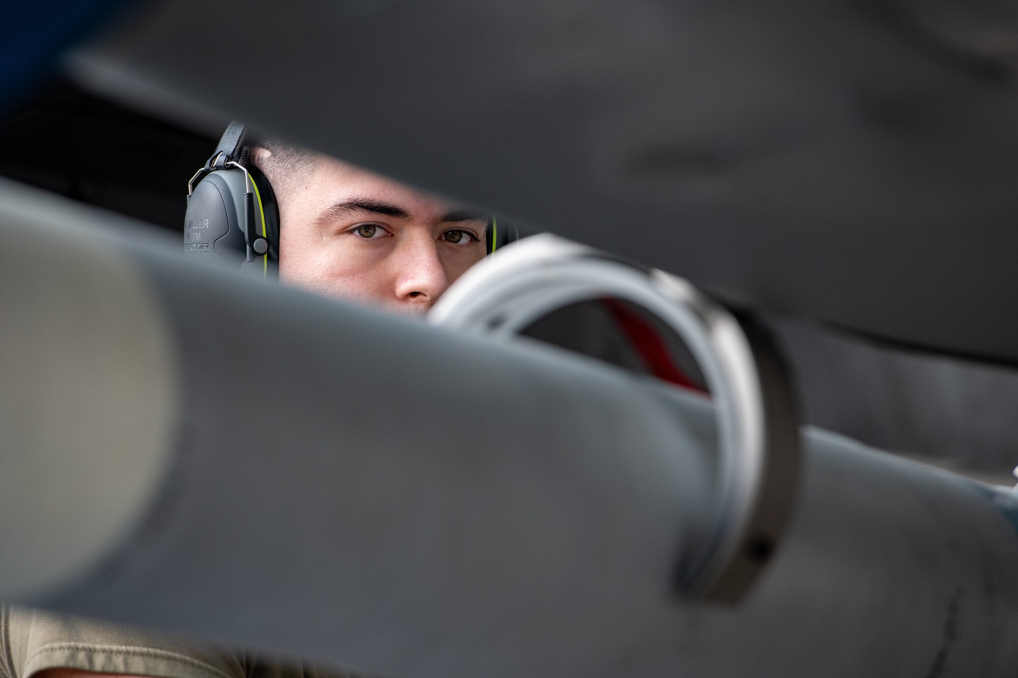 An Airman from the 18th Aircraft Maintenance Squadron loads an AIM-120 Advanced Medium Range Air-to-Air Missile onto an F-15C Eagle during a weapons load competition at Kadena Air Base, Japan, Nov. 17, 2023. Kadena’s maintenance Airmen are entrusted with the task of ensuring Kadena’s fleet of more than 100 aircraft are safe and ready to project airpower across the Indo-Pacific region. (U.S. Air Force Photo by Lt. Col. Raymond Geoffroy)
