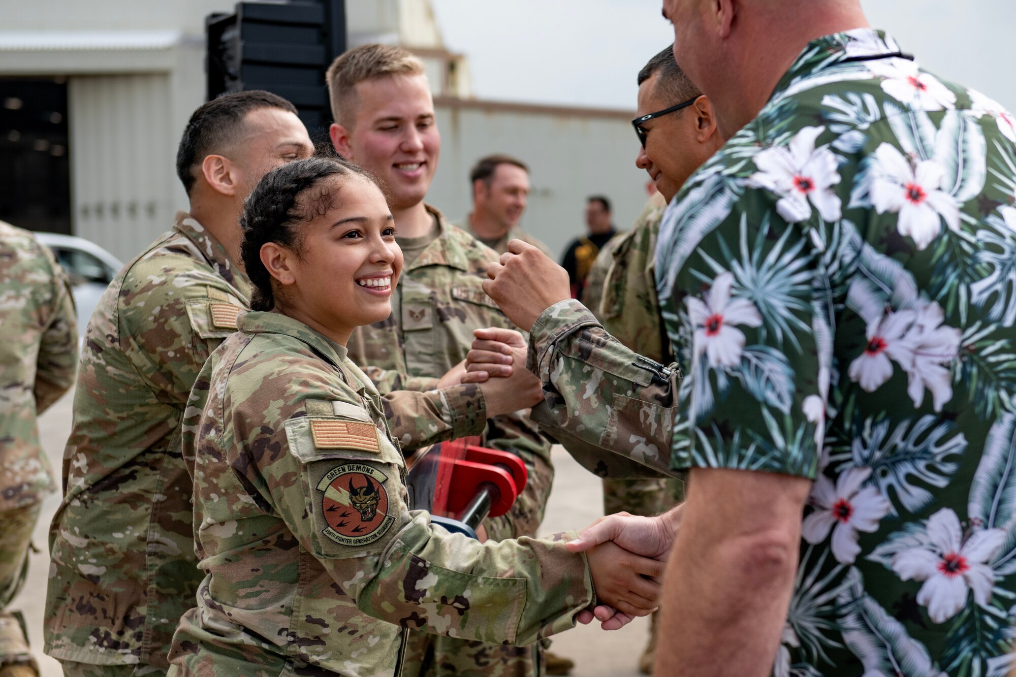 Airmen assigned to the 356th Fighter Generation Squadron are congratulated on their victory during a quarterly weapons load competition at Kadena Air Base, Japan, Nov. 17, 2023. Kadena’s aircraft weapons load teams face off quarterly to test the skill and professionalism of Kadena Airmen while building camaraderie among the base’s diverse team of aircraft maintainers. (U.S. Air Force Photo by Staff Sgt. Jessi Roth)