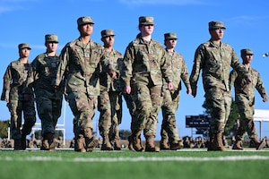 Angelo State University ROTC cadets execute drill movements during the 17th Training Wing Drill Down Competition at Mathis Field, Goodfellow Air Force Base, Texas, Nov. 17, 2023. ASU and Goodfellow often hold collaborative events that involve ROTC involvement on and off base to prepare them for the transition from cadet to Air Force leader. The 17th TRW drill down hosted ASU ROTC cadets; the 312th, 313th and 315th Training Squadrons; as well as the 533rd TRS Detachment 1. (U.S. Air Force photo by Airman 1st Class Madison Collier)