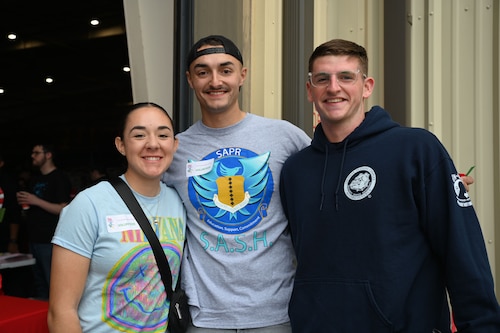 U.S. Air Force Airman Lucy Serna, left, Airman 1st Class Tyler Warren, middle, and Airman Nathaniel Corbin, right, 17th Training Wing students volunteer at the 41st Santa’s Market at the Louis F. Garland Department of Defense Fire Academy, Goodfellow Air Force Base, Texas, Nov. 18, 2023. Members of Goodfellow were able to volunteer to hand out tickets, assist with setting up the event and educate guests on the different missions carried out on base.