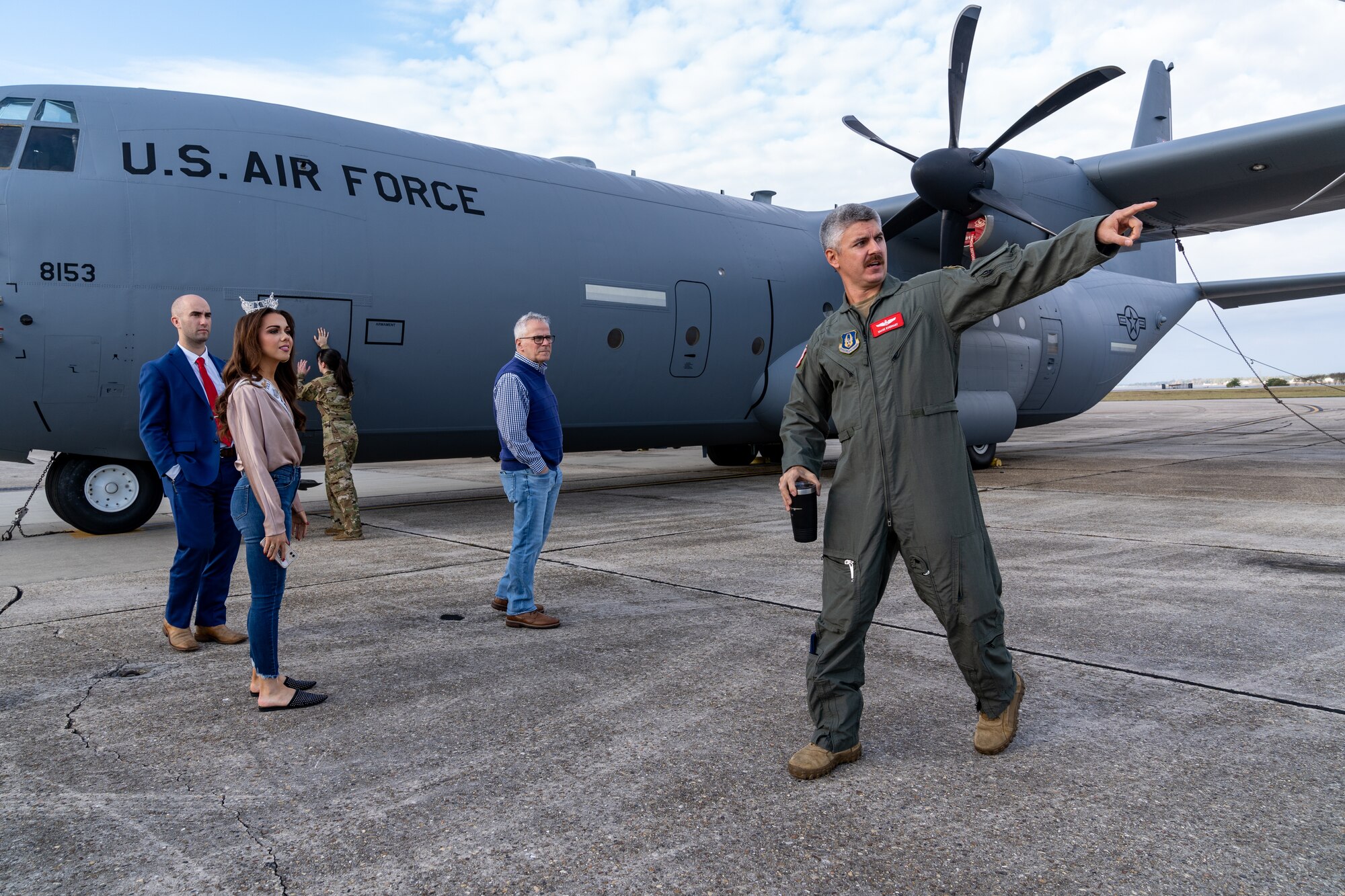 U.S. Air Force Maj. Michael Everhart, 815th Airlift Squadron pilot, describes the uses of the C-130 J Hercules used by the ‘Flying Jennies’ during a tour for Vivian O’Neal, Miss Mississippi 2023, at Keesler Air Force Base, Mississippi, Nov. 20, 2023.