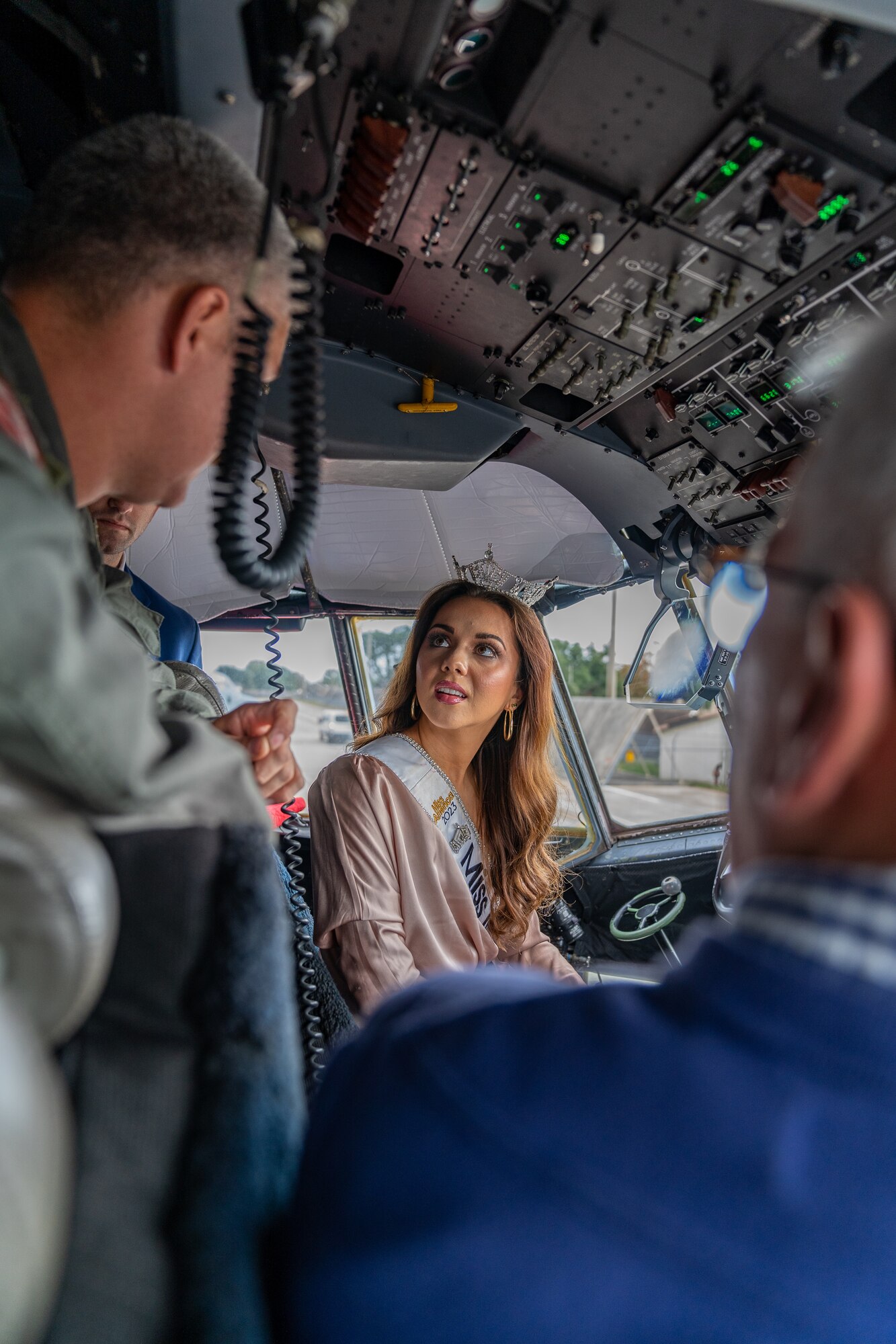 Vivian O’Neal, Miss Mississippi 2023, and her father, Dr. Anthony O’Neal, tour a C-130 J Hercules during their visit at Keesler Air Force Base, Mississippi, Nov. 20, 2023.