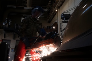 U.S. Air Force Senior Airman Tyler White, 49th Equipment Maintenance Squadron crash recovery journeyman, breaks down a wheel of an F-16 Viper at Holloman Air Force Base, New Mexico, Nov. 20, 2023. The 49th EMS crash recovery team specializes in the challenging task of recovering damaged aircraft, expertly performing sortie generation and ground handling operations, and conducting thorough inspections to assess and address the specific needs of each compromised aircraft. (U.S. Air Force photo by Airman 1st Class Isaiah Pedrazzini)
