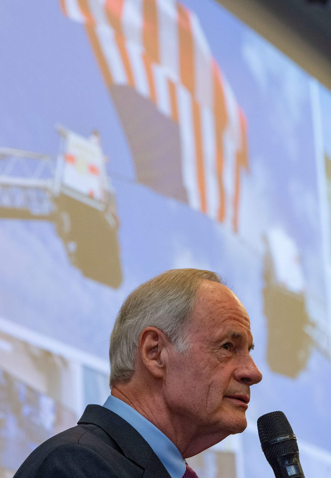 U.S. Sen. Tom Carper, addresses U.S. congressional delegates from Delaware, Central Delaware Chamber of Commerce members, local civic and business leaders, and Team Dover members at the 2023 State of the Base briefing on Dover Air Force Base, Delaware, Nov. 20, 2023. The event, hosted by the CDCC, provided an opportunity to educate and inform community members and leaders on how the Dover community ties into the base's mission, vision and priorities. (U.S. Air Force photo by Roland Balik)