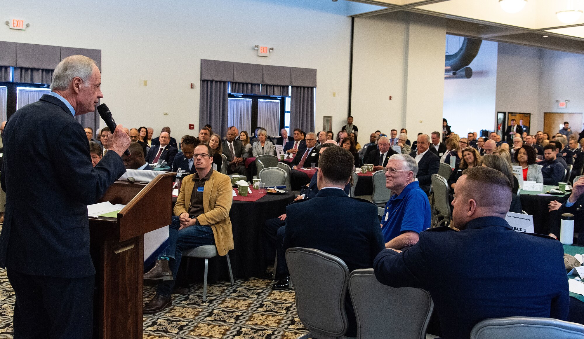 U.S. Sen. Tom Carper, addresses U.S. congressional delegates from Delaware, Central Delaware Chamber of Commerce members, local civic and business leaders, and Team Dover members at the 2023 State of the Base briefing on Dover Air Force Base, Delaware, Nov. 20, 2023. The event, hosted by the CDCC, provided an opportunity to educate and inform community members and leaders on how the Dover community ties into the base's mission, vision, and priorities. (U.S. Air Force photo by Roland Balik)