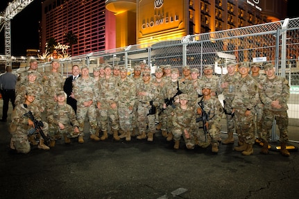 Members of the 72nd Military Police Company, Nevada National Guard, pose for a photo with state command leaders in Las Vegas Nov. 17, 2023. The 72nd MPs enhanced security at the Las Vegas Strip for the Formula 1 Grand Prix.