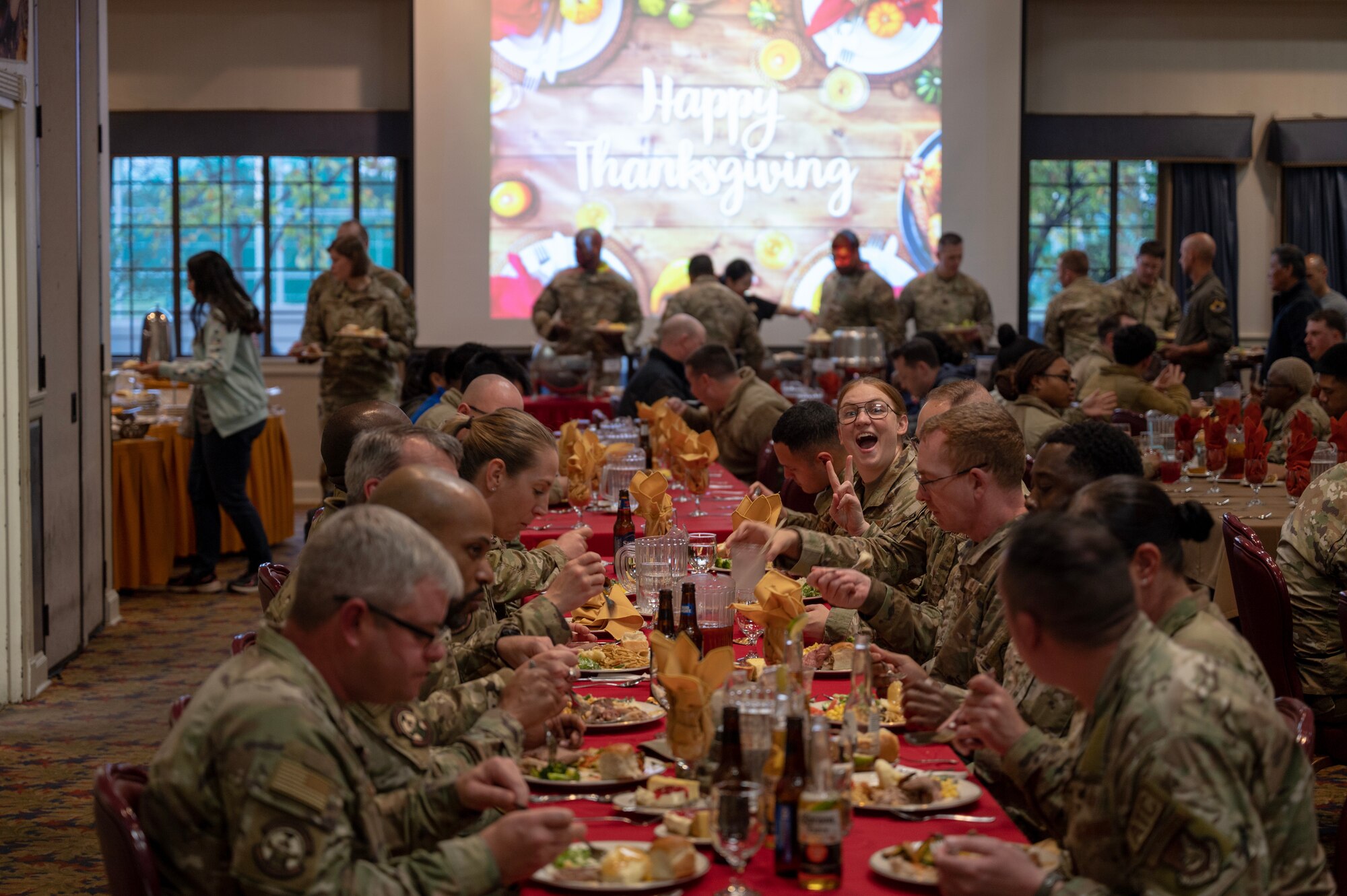 Airmen assigned to the 8th Fighter Wing, Kunsan Air Base, Republic of Korea, dine during the annual Thanksgiving meal hosted by the Korean-American Gunsan Alliance.