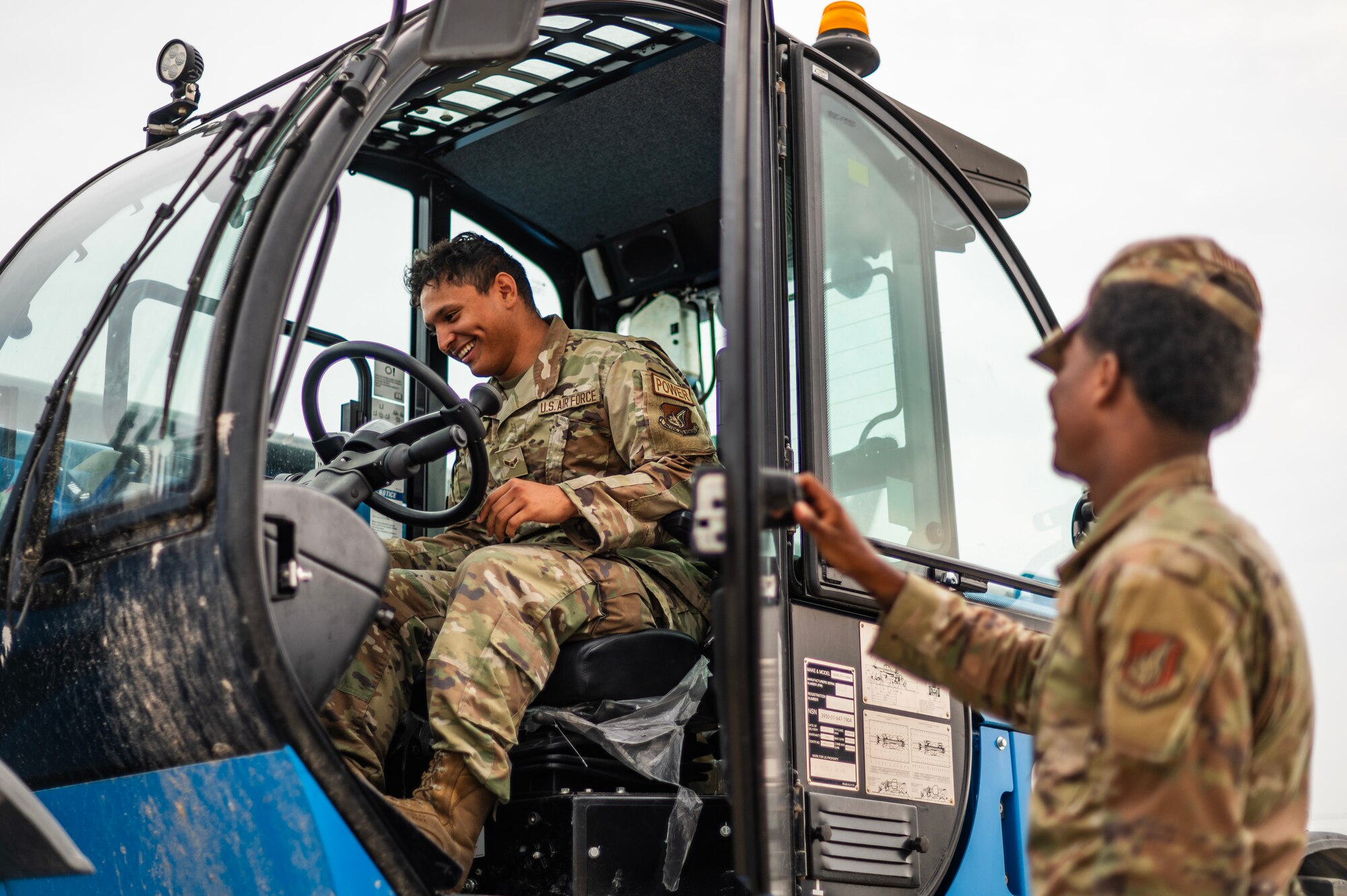 Airman instructs another Airman on procedures to operate a telehandler during a Prime Base Engineer Emergency Force or “Prime BEEF” training at Kunsan Air Base.