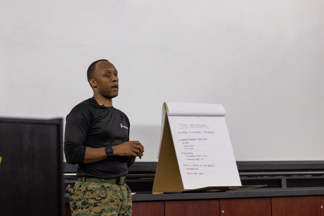 U.S. Marine Corps Capt. Aaron Webster, the national partnerships action officer with Marine Corps Recruiting Command, speaks to coaches during the American Baseball Coaches Association clinic, on the campus of the University of Maryland - College Park, on Nov. 11, 2023. The Marine Corps National Partnerships ensure the coaches of the next generation of Marines have the resources and skills to accurately present the Marine Corps as an option to their athletes, and support recruiter access to prospective audiences. (U.S. Marine Corps Photo by Lance Cpl. Payton Goodrich)