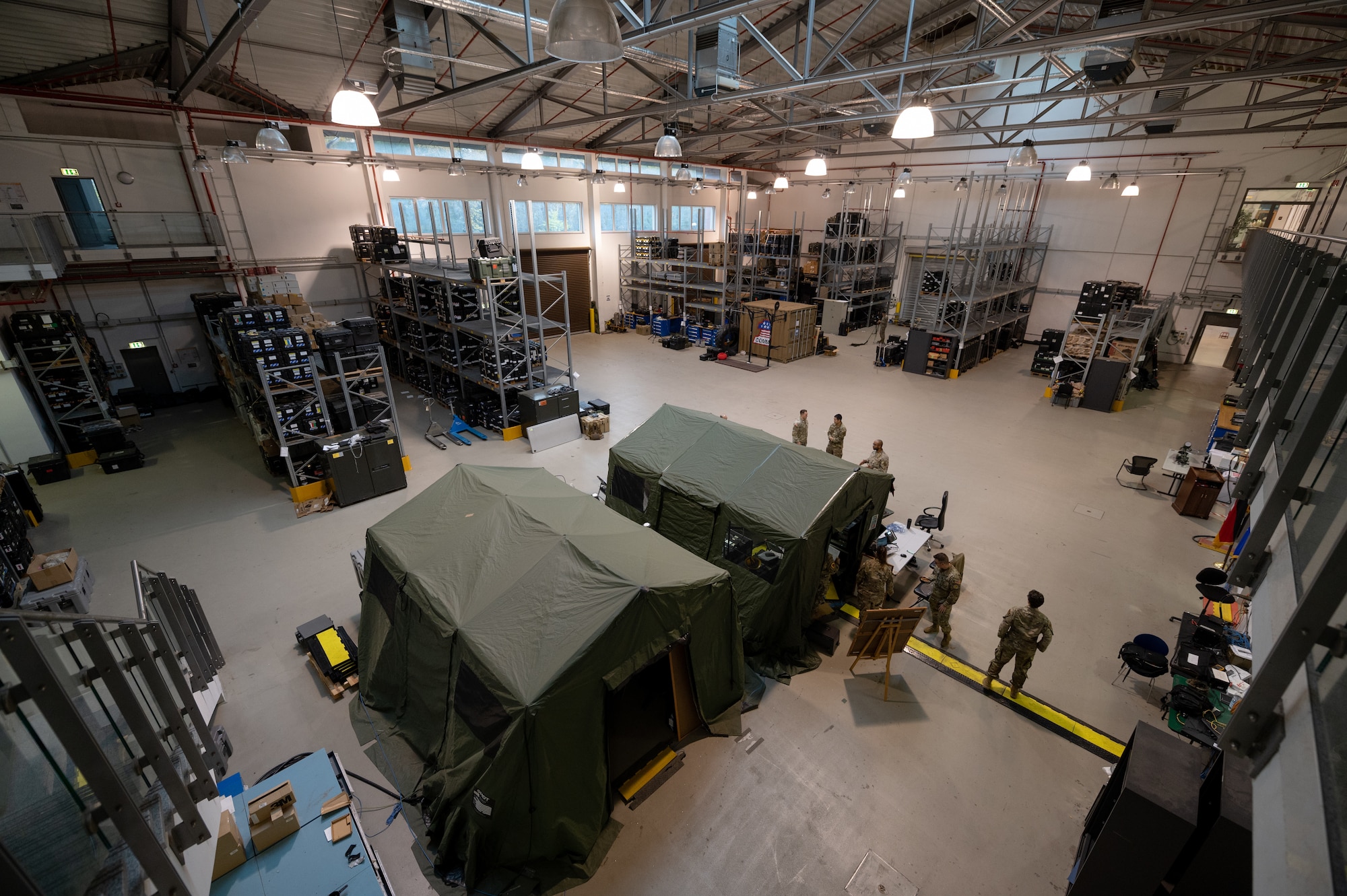 Military personnel assigned to the 527th/26th Space Aggressor Squadron and 2d Multi-Domain Task Force provide real-time monitoring of health and wellness for military satellites during Exercise HEAVY RAIN 23, Nov. 16, 2023 at Ramstein Air Base, Germany. HEAVY RAIN is a U.S. Air Forces in Europe-led command and control exercise that tests and evaluates communication and data-sharing capabilities among the joint force, NATO Allies and partners. (U.S. Air Force Photo by Senior Airman Edgar Grimaldo)