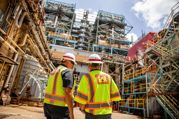 U.S. Army Corps of Engineers, Omaha District’s Jeremy Ayala (left), Rapid Response Technical Center of Expertise Contracting Officer Representative, and Rich McConnel (right), Chief, Interagency & International Services/Rapid Response TCX, discuss the Puerto Rico power mission on site in San Juan, Puerto Rico.