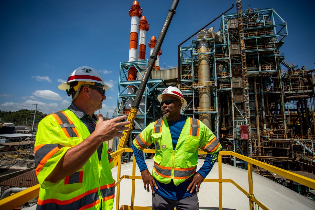 U.S. Army Corps of Engineers, Omaha District’s Rich McConnel (left), Chief, Interagency & International Services/Rapid Response Technical Center of Expertise, and Anthony Kearney (right), Rapid Response TCX Construction Manager, discuss the Puerto Rico power mission on site in San Juan, Puerto Rico.