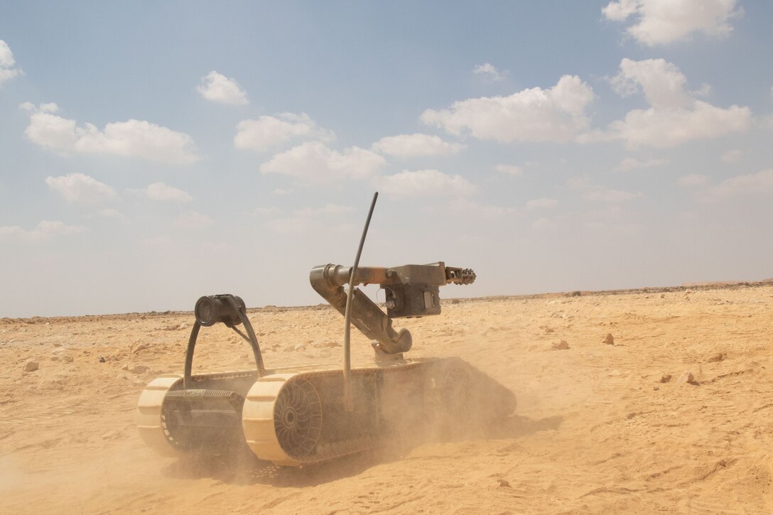 Ground robot moves through sand.