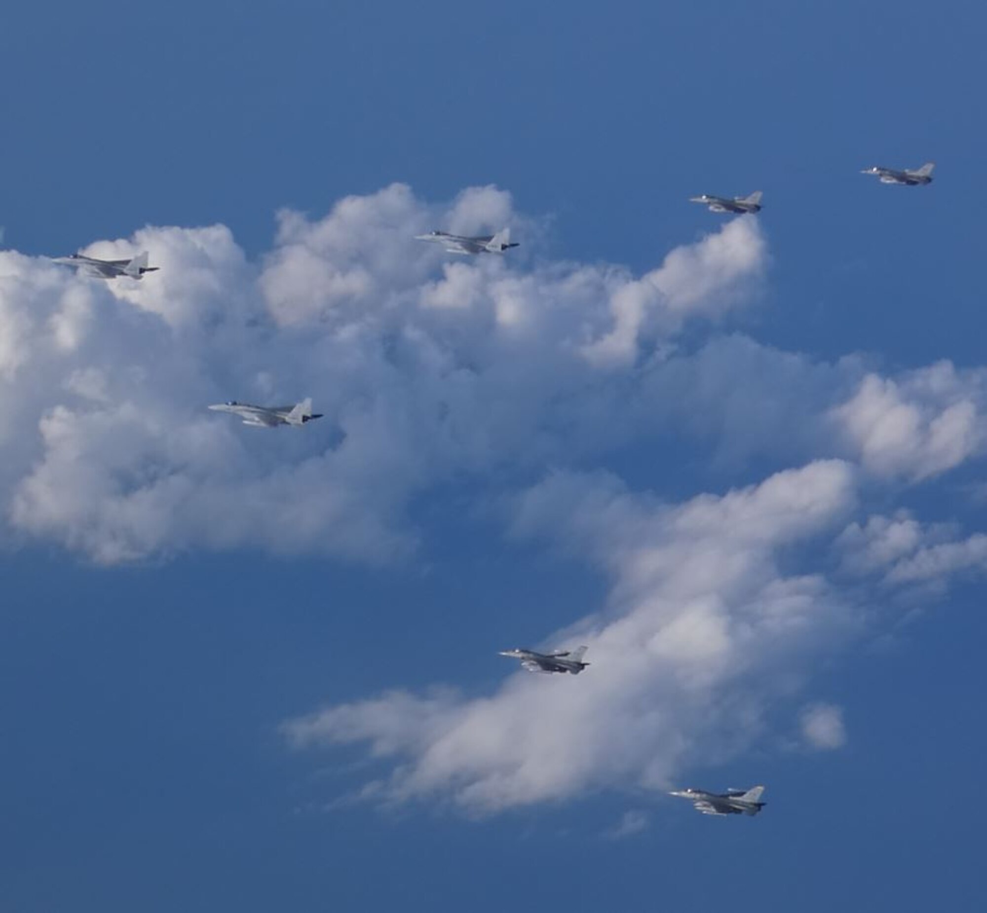 Photo of US Air Force and Japan Air Self Defense Force aircraft flying together