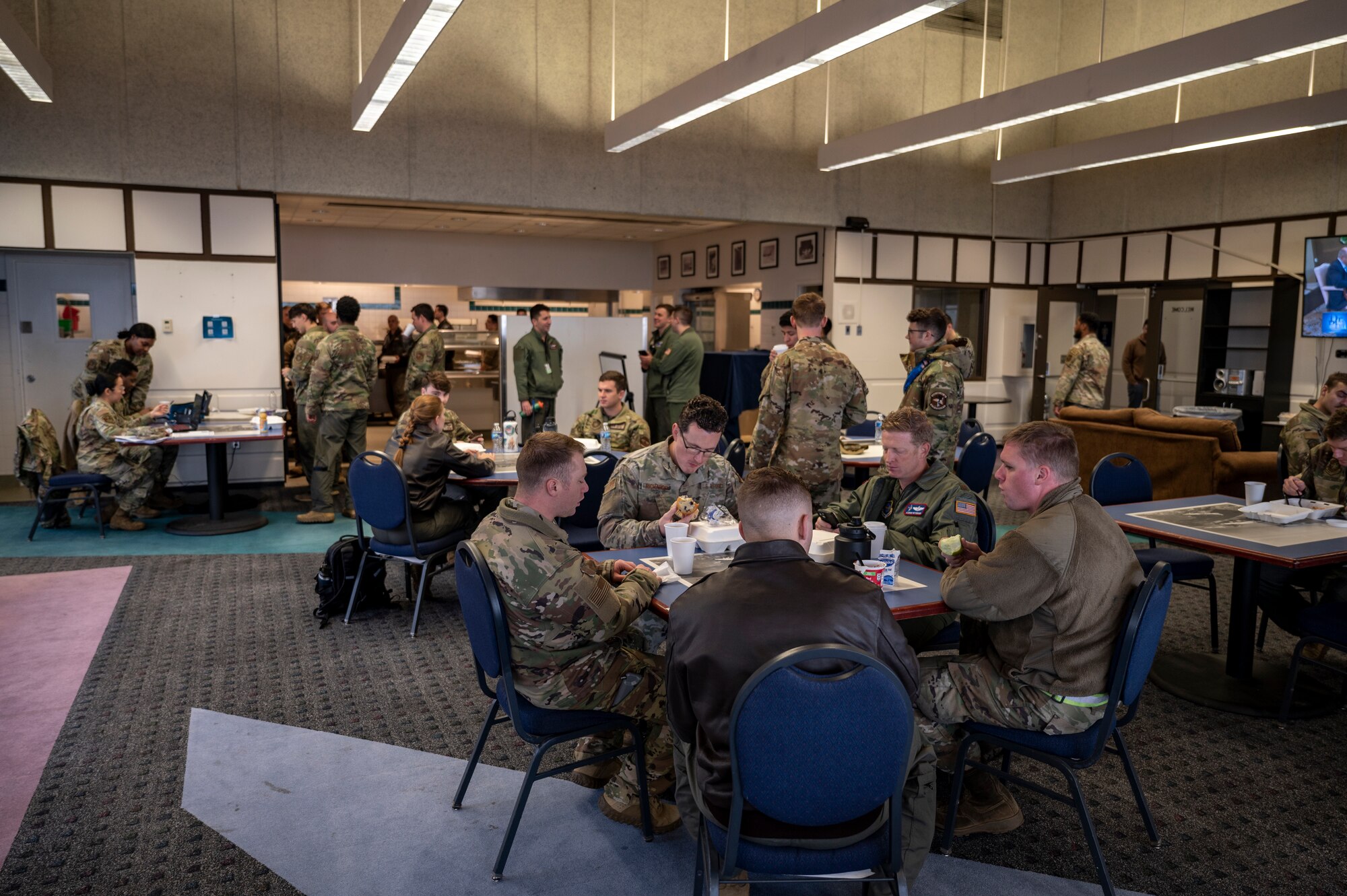 Airmen stand by in a DFAC