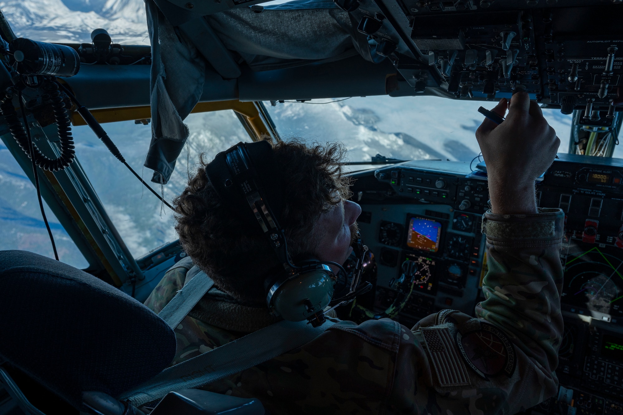 A pilot flies an airplane