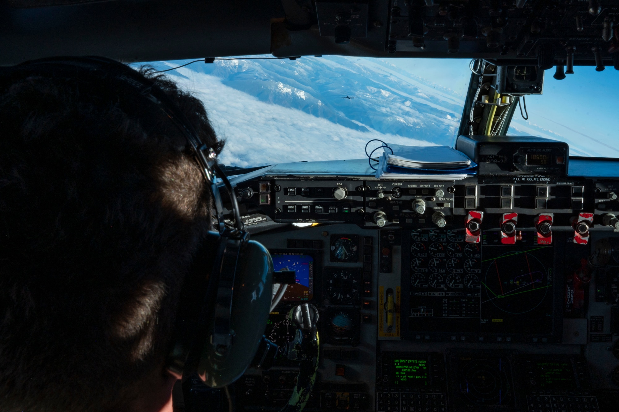 A pilot flies a plane.