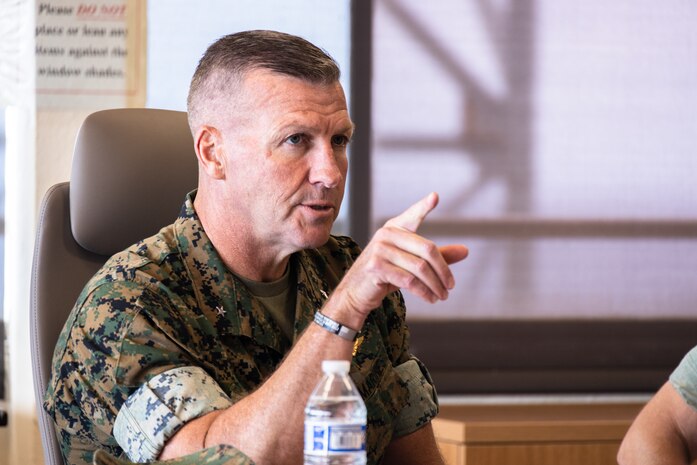 U.S. Marine Corps Brig. Gen. Simon Duran, director, Strategy and Plans Division, Plans, Policies, and Operations (PP&O), Headquarters Marine Corps, discusses community engagement efforts with Marine Corps Base Hawaii leadership and PP&O staff during a visit at Kansas Tower Hill, MCBH, Nov. 16, 2023. PP&O staff visited the base to discuss topics related to training, community engagement, and force modernization. (U.S. Marine Corps photo by Sgt. Brandon Aultman)