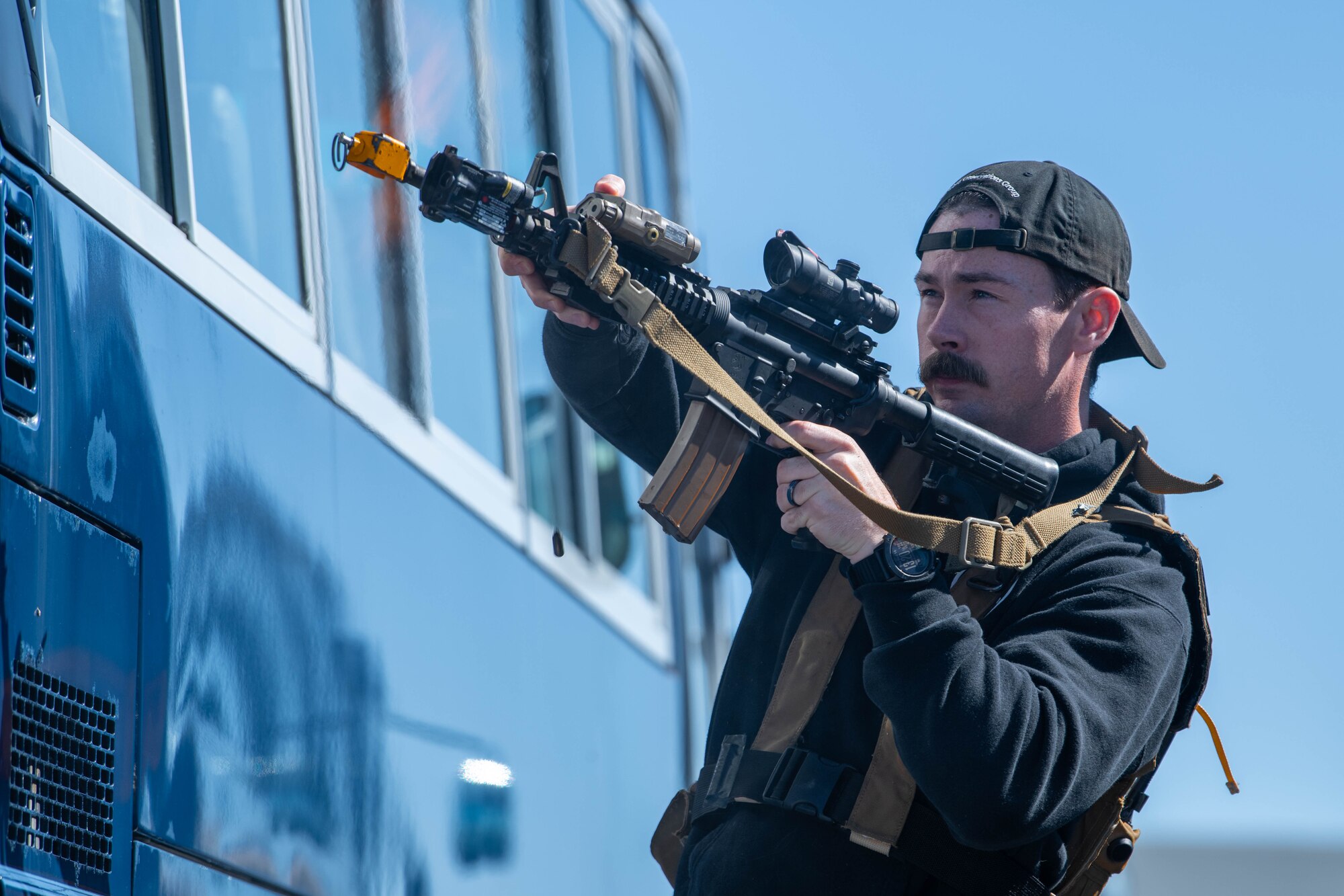 U.S. Air Force 18th SFS members firing an M4A1