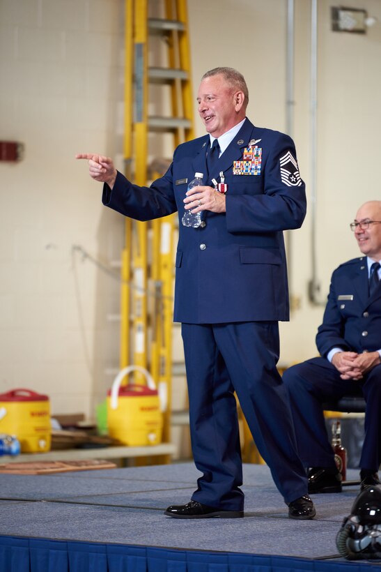 Chief Master Sgt. Danny Gregory, senior enlisted leader of the 165th Airlift Squadron’s Flight Engineer Section, speaks to a group of family, friends and fellow Airmen at his retirement ceremony at the Kentucky Air National Guard Base in Louisville, Ky., Sept. 9, 2023. Gregory retired from the 123rd Airlift Wing after more than 40 years in the military. (U.S. Air National Guard photo by Phil Speck)