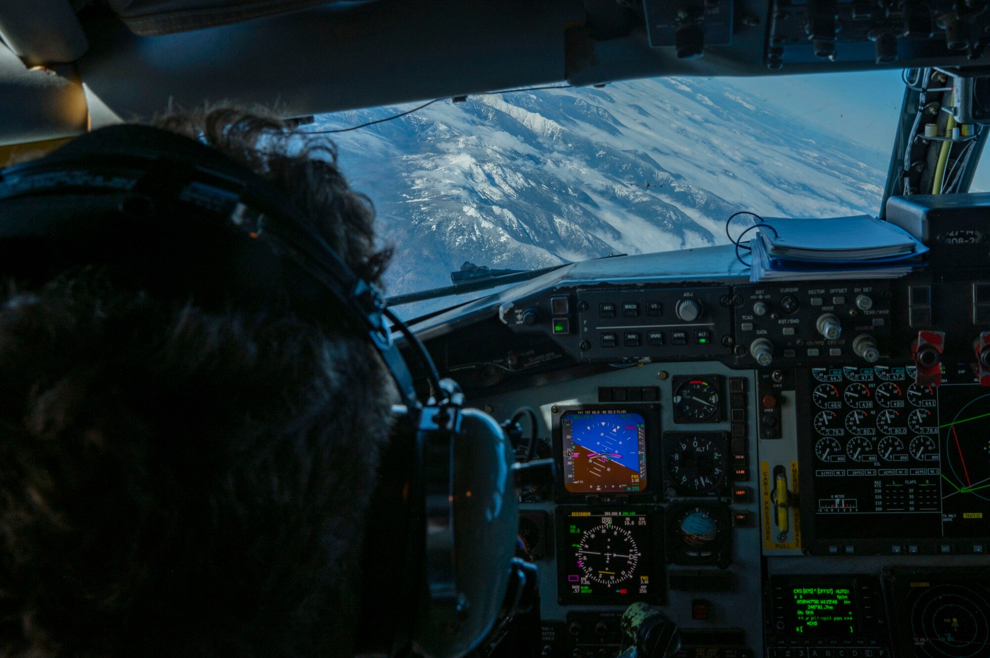 A pilot flies a plane.