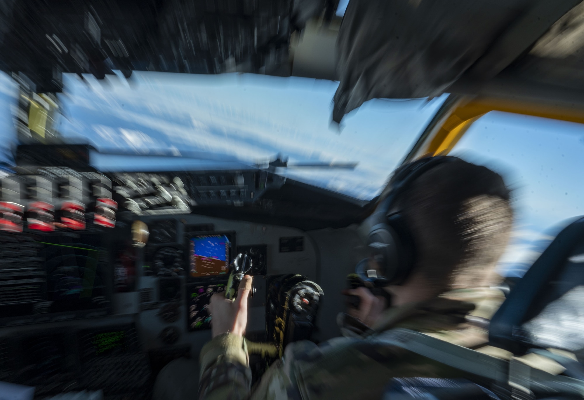 A pilot flies an airplane.