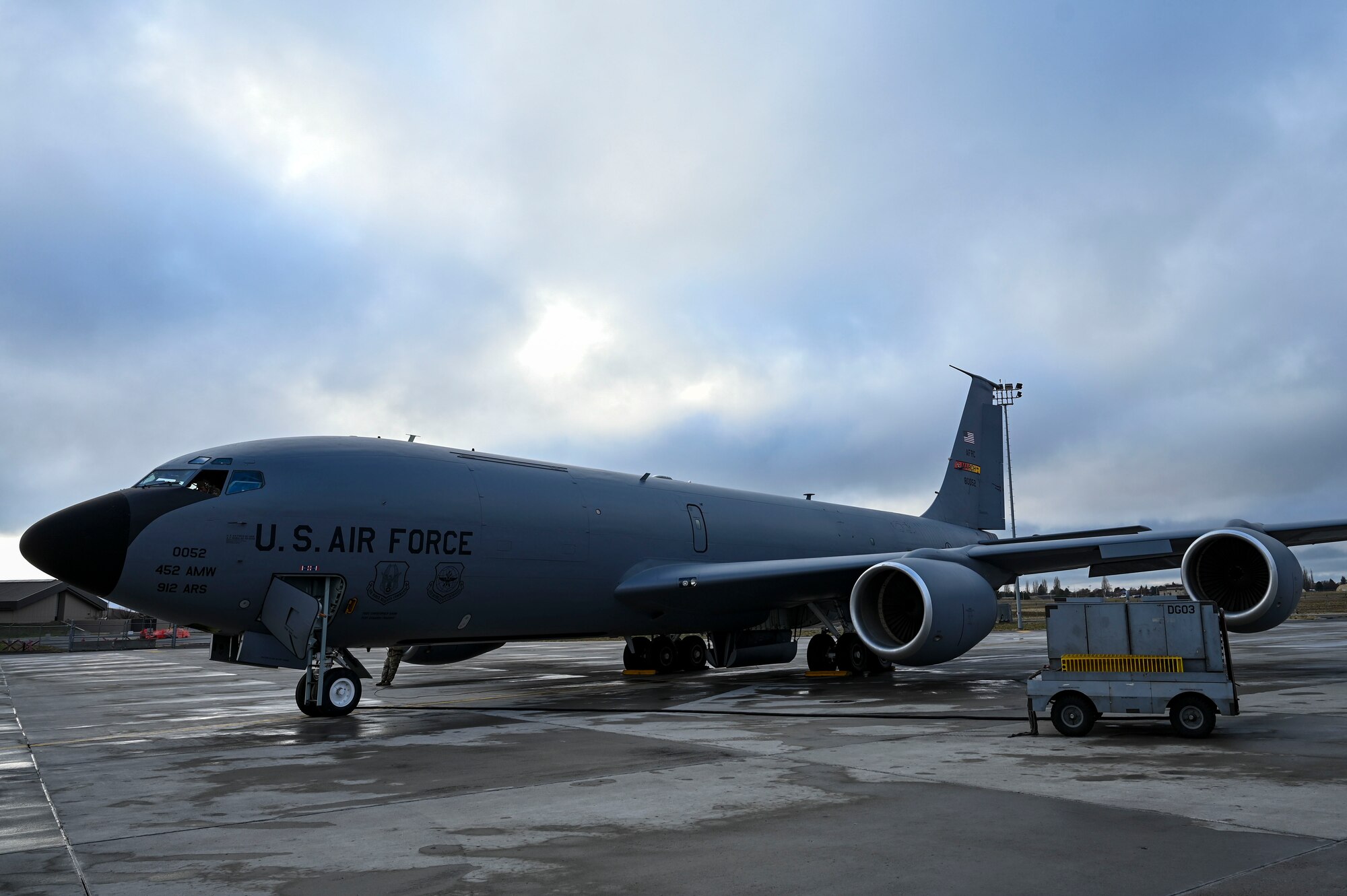 An aircraft sits on the flightline.