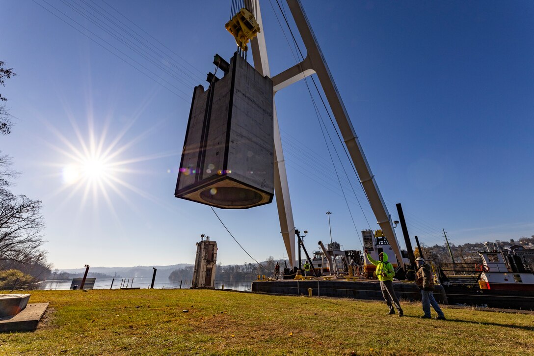 Contractors working for the U.S. Army Corps of Engineers Pittsburgh District install a 23-foot-tall concrete shaft enclosure weighing approximately 120,000 pounds as part of the guard wall at the Monongahela River Locks and Dam 4 in Charleroi, Pennsylvania, Nov. 16, 2023.