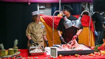 YOKOSUKA, Japan (Nov. 23, 2023) – Chief of Naval Operations Adm. Lisa Franchetti serves Thanksgiving dinner to Sailors aboard the U.S. Navy's only forward-deployed aircraft carrier USS Ronald Reagan (CVN 76), Nov. 23. Franchetti and Master Chief Petty Officer of the Navy James Honea visited Reagan and other 7th Fleet commands to engage with Sailors and Navy leadership to highlight Franchetti's priority of strengthening the Navy team. (U.S. Navy photo by Chief Mass Communication Specialist Amanda R. Gray)