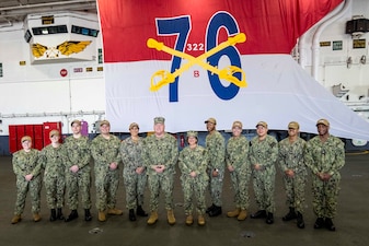 YOKOSUKA, Japan (Nov. 23, 2023) – Chief of Naval Operations Adm. Lisa Franchetti and Master Chief Petty Officer of the Navy James Honea visit Sailors aboard the U.S. Navy's only forward-deployed aircraft carrier USS Ronald Reagan (CVN 76), Nov. 23. Franchetti and Honea visited Reagan and other 7th Fleet commands to engage with Sailors and Navy leadership to highlight Franchetti's priority of strengthening the Navy team. (U.S. Navy photo by Chief Mass Communication Specialist Amanda R. Gray)