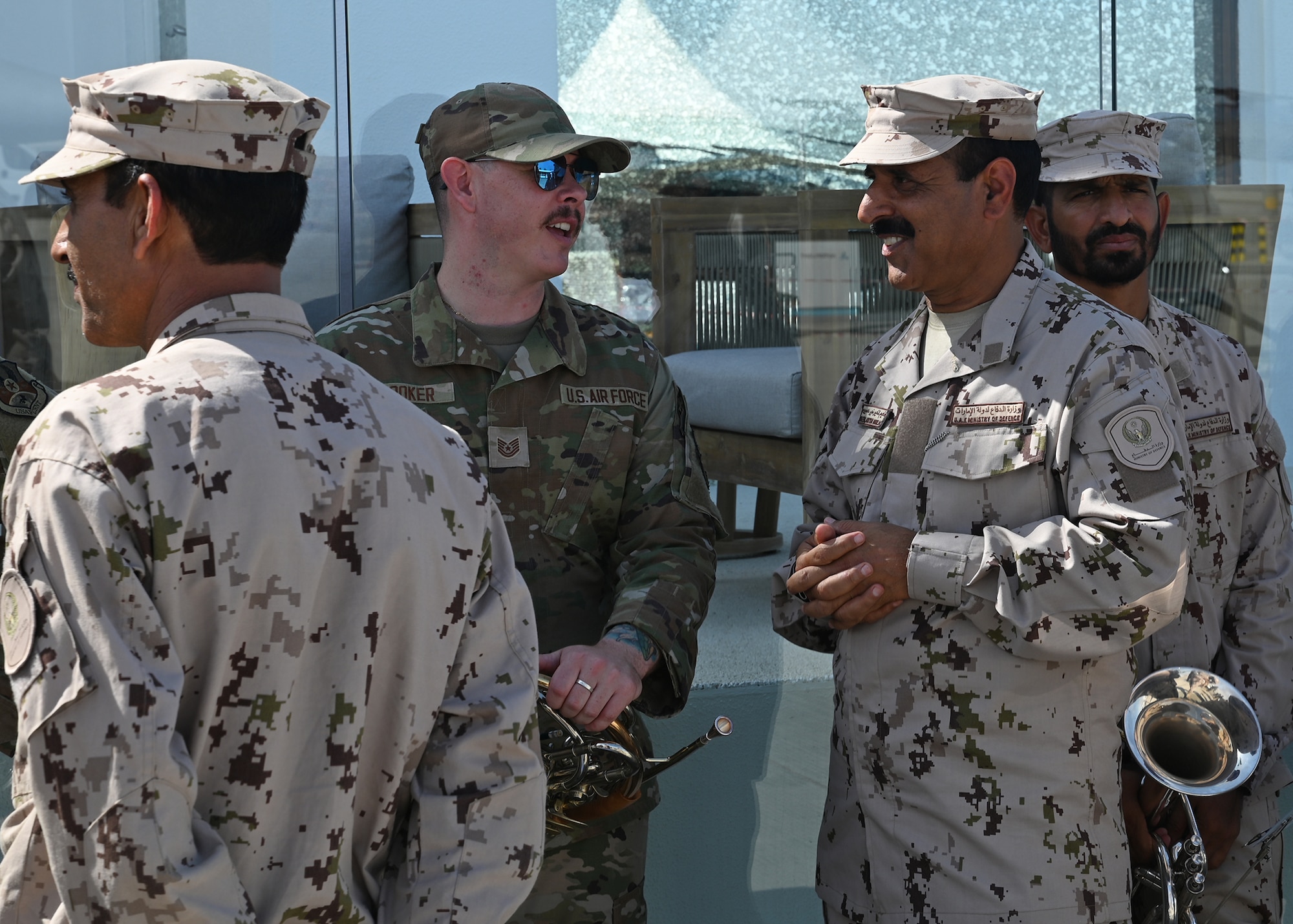 US and UAE services members interact.