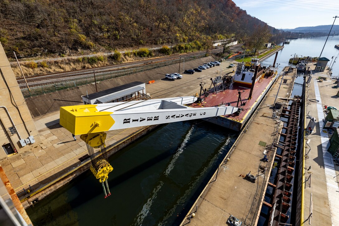 Contractors working for the U.S. Army Corps of Engineers Pittsburgh District install a 23-foot-tall concrete shaft enclosure weighing approximately 120,000 pounds as part of the guard wall at the Monongahela River Locks and Dam 4 in Charleroi, Pennsylvania, Nov. 16, 2023.