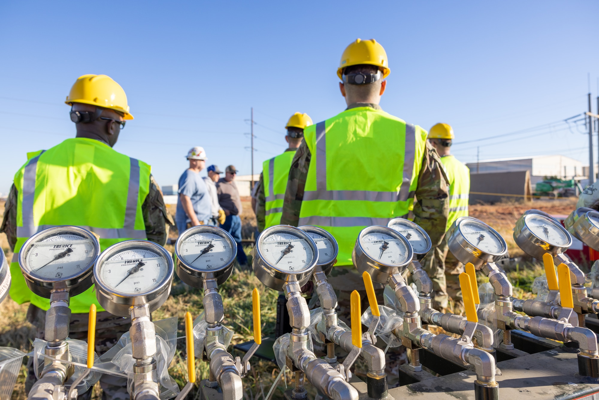 Air bag control valves wait at the ready as team members hold meeting to begin CDDAR exercise.