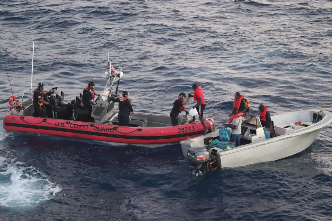 A small boat crew from the U.S. Coast Guard Cutter Legare transfers Haitian migrants, Nov. 7, 2023, near Cap-Haïtien, Haiti. Legare patrolled over 11,000 nautical miles in support of Homeland Security Task Force – Southeast and Operation Vigilant Sentry within the Coast Guard Seventh District’s area of responsibility.