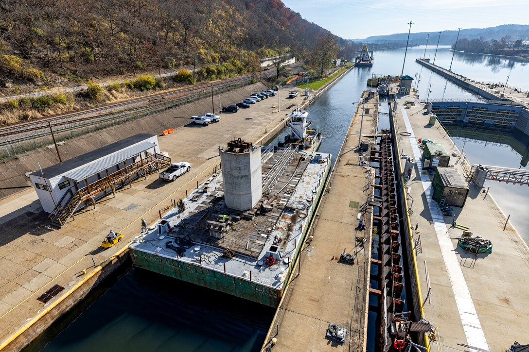 Contractors working for the U.S. Army Corps of Engineers Pittsburgh District install a 23-foot-tall concrete shaft enclosure weighing approximately 120,000 pounds as part of the guard wall at the Monongahela River Locks and Dam 4 in Charleroi, Pennsylvania, Nov. 16, 2023.