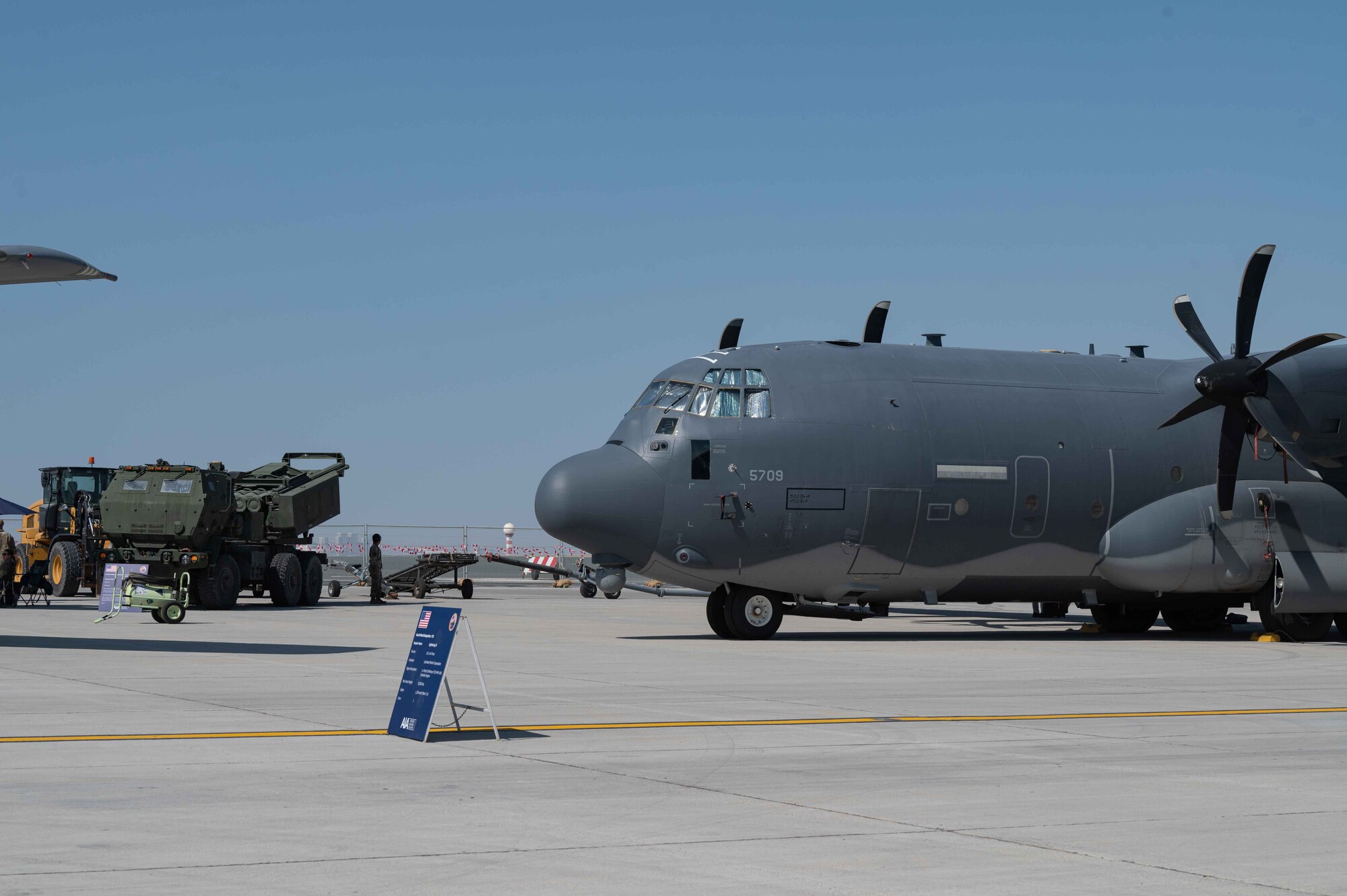 Aircraft sit on a flight line.