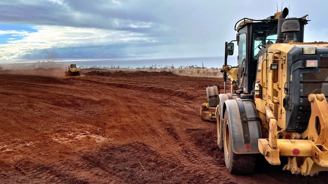 U.S. Army Corps of Engineers contractors prepare a site for construction of a new temporary elementary school campus for the Lahaina, Hawai'i, community, Nov. 20, 2023, after receiving the Notice to Proceed earlier in the day.