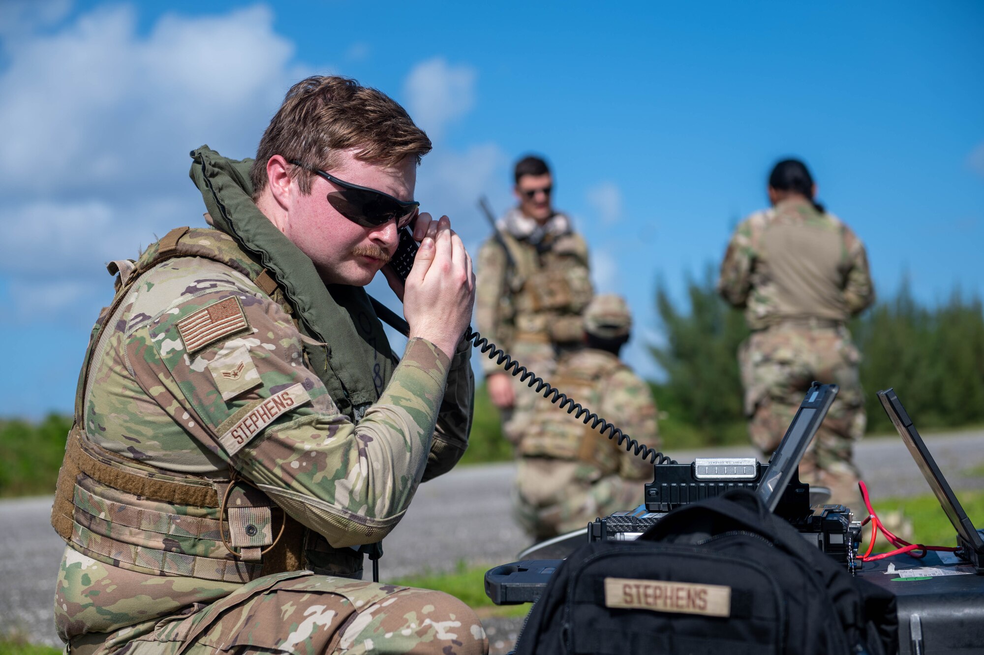 U.S. Air Force Airman 1st Class Alexander Stephens, 644th Combat Communication Squadron network infrastructure technician, sets up a communications system at Tinian, Nov. 14, 2023