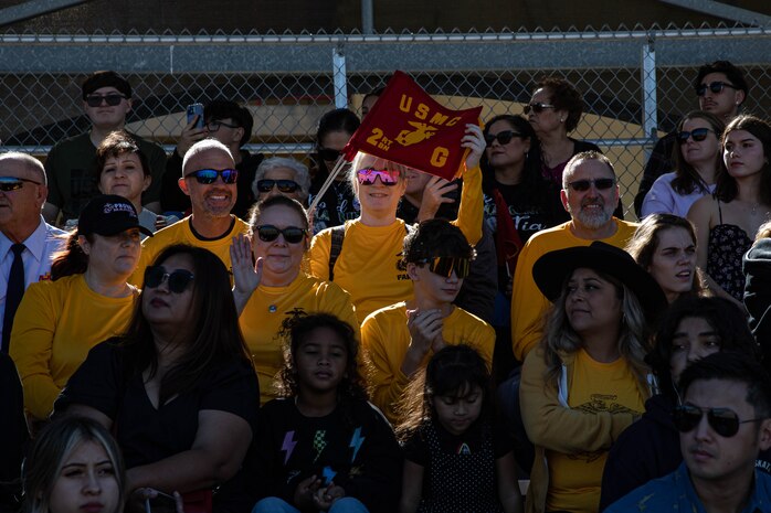 Family and friends of the new U.S. Marines with Golf Company, 2nd Recruit Training Battalion, wait patiently to greet their Marines for family day at Marine Corps Recruit Depot San Diego, Nov. 20, 2023. After a long, 13 weeks of physical and mental challenges, early mornings, letters to and from home, this is the first time friends and families will see their newly transformed Marines. (U.S. Marine Corps photo by Lance Cpl. Sarah M. Grawcock)