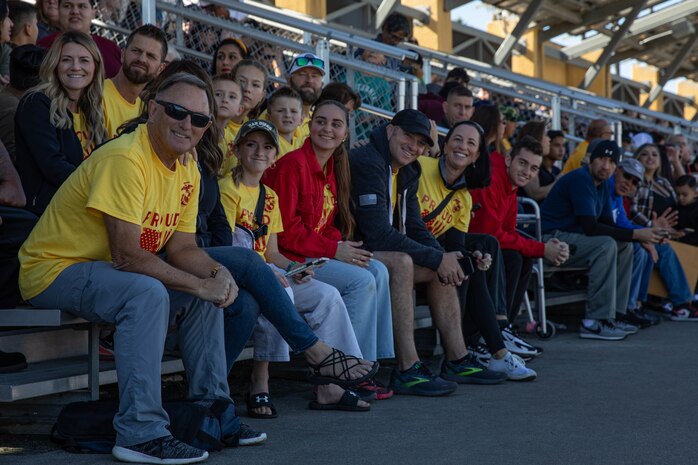 Family and friends of the new U.S. Marines with Golf Company, 2nd Recruit Training Battalion, wait to greet their Marines for family day at Marine Corps Recruit Depot San Diego, Nov. 20, 2023. After a long, 13 weeks of physical and mental challenges, early mornings, letters to and from home, this is the first time friends and families will see their newly transformed Marines. (U.S. Marine Corps photo by Lance Cpl. Sarah M. Grawcock)