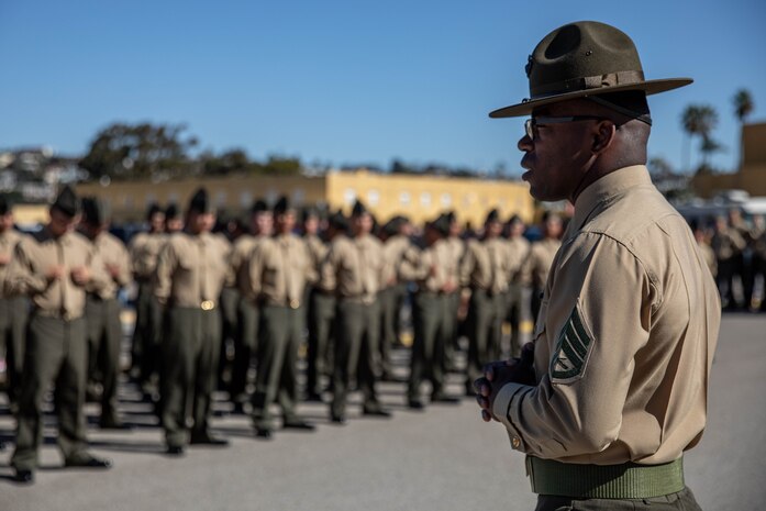 A U.S. Marine Corps drill instructor with Golf Company, 2nd Recruit Training Battalion, speaks to his Marines before their family day ceremony at Marine Corps Recruit Depot San Diego, Nov. 20, 2023. After a long, 13 weeks of physical and mental challenges, early mornings, letters to and from home, this is the first time friends and families will see their newly transformed Marines. (U.S. Marine Corps photo by Lance Cpl. Sarah M. Grawcock)