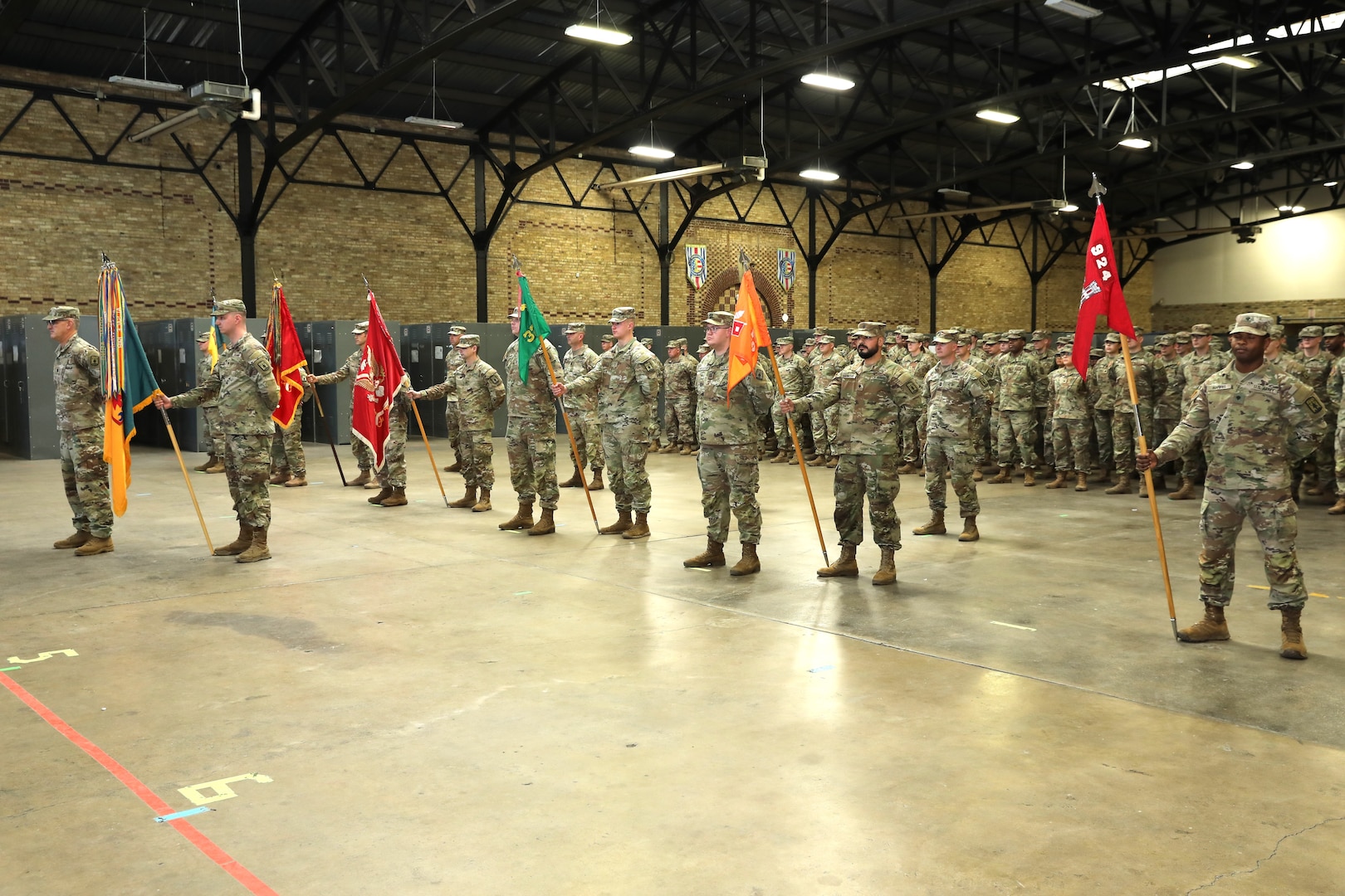 Soldiers of the 157th Maneuver Enhancement Brigade stand in formation during a formal change of command ceremony Nov. 4 at the Richards Street Armory in Milwaukee. During the ceremony, Col. Paul Gapinski assumed command of the “Iron Brigade” from Col. Eric Leckel. Wisconsin National Guard photo by Sgt. 1st Class Katie Theusch