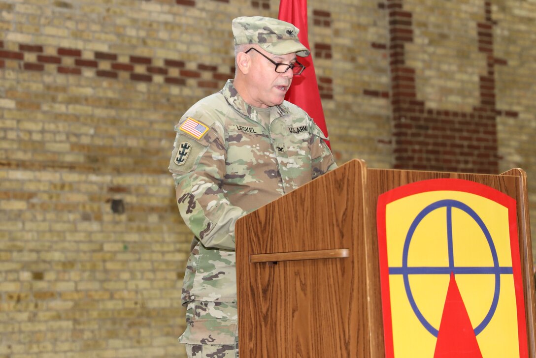 Col. Eric Leckel, outgoing commander of the 157th Maneuver Enhancement Brigade, addresses the Soldiers of the brigade for the last time as as commander during a formal change of command ceremony Nov. 4 at the Richards Street Armory in Milwaukee. Col. Paul Gapinski assumed command of the brigade. Wisconsin National Guard photo by Sgt. 1st Class Katie Theusch