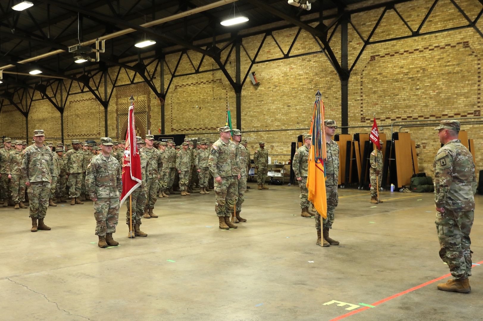 Col. Paul Gapinski takes charge of the Soldiers of the 157th Maneuver Enhancement Brigade for the first time as commander of the “Iron Brigade.” Gapinski assumed command of the brigade during a formal change of command ceremony Nov. 4 at the Richards Street Armory, Milwaukee. Wisconsin National Guard photo by Sgt. 1st Class Katie Theusch