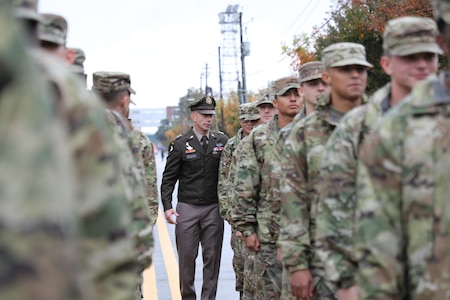 Cyber Center of Excellence and Fort Eisenhower Command General Major Paul Stanton reviews troops during the Veterans Day Parade in downtown Augusta, Ga. Nov. 12, 2023.