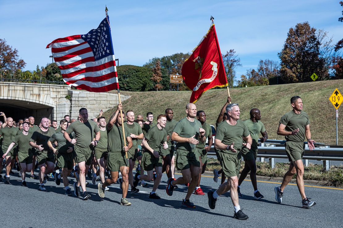The Assistant Commandant of the Marine Corps Gen. Christopher J. Mahoney and Sergeant Major of the Marine Corps Carlos A. Ruiz lead Marines in a motivational run in honor of the Marine Corps' 248th birthday in Arlington, Va., Nov. 8, 2023. Each year, Marines come together to celebrate our birthday with ceremonies that recall the history of the Corps, and enhance the camaraderie shared across generations of Marines. (U.S. Marine Corps photo by Lance Cpl. Joseph E. DeMarcus)