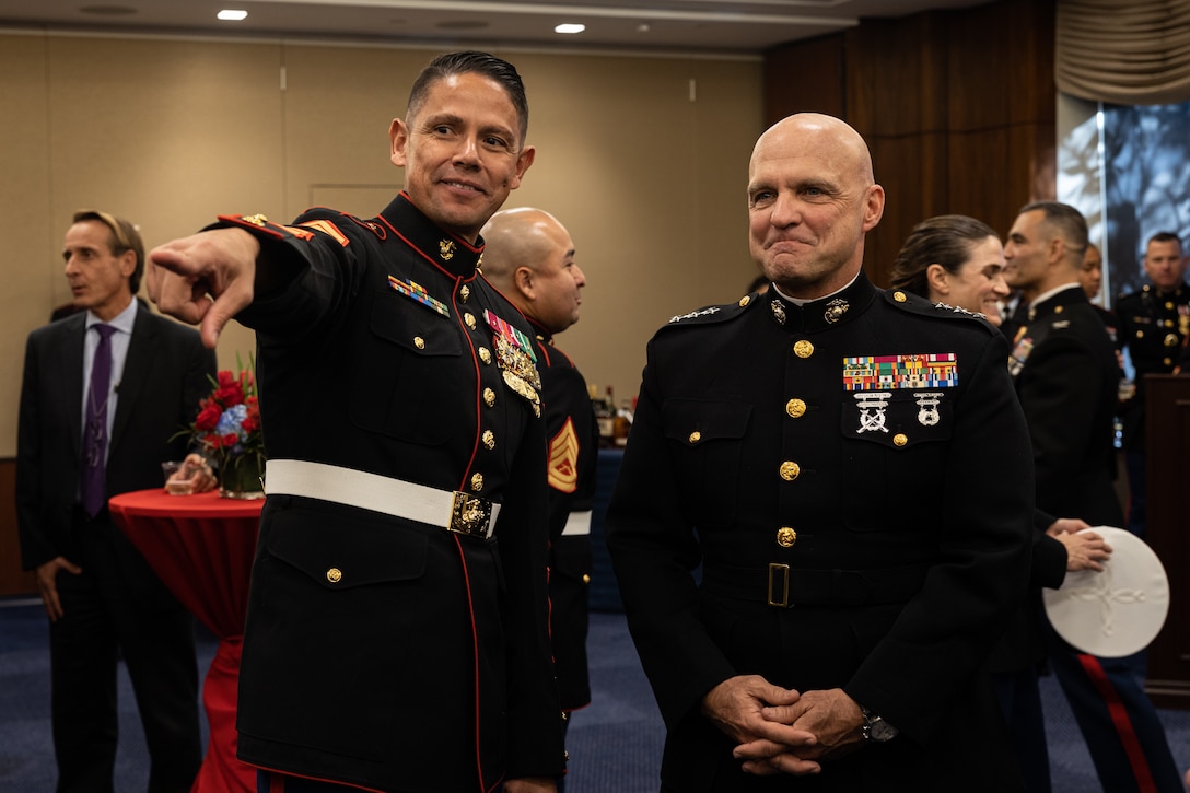 The 20th Sergeant Major of the Marine Corps Sgt. Maj. Carlos A. Ruiz speaks with Lt. Gen. David Bellon, commanding general of Marine Corps Forces Reserve and Marine Corps Forces South, during a cake cutting ceremony in Washington, D.C., Nov. 14, 2023. Each year the Marine Corps hosts a Marine Corps Birthday Cake Cutting Ceremony for the House of Representatives in honor of Marines, past and present, serving on Capitol Hill. (U.S. Marine Corps photo by Lance Cpl. Joseph E. DeMarcus)