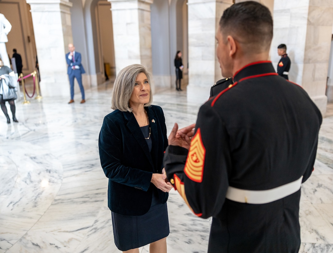 The 20th Sergeant Major of the Marine Corps Sgt. Maj. Carlos A. Ruiz speaks with Iowa Senator Joni Ernst during a cake cutting ceremony at the U.S. Senate in Washington, D.C., Nov. 15, 2023. Each year the Marine Corps hosts a Marine Corps Birthday Cake Cutting Ceremony for the U.S. Senate in honor of Marines past and present, serving on Capitol Hill. (U.S. Marine Corps photo by Cpl. Santicia Ambriez-Stippey)