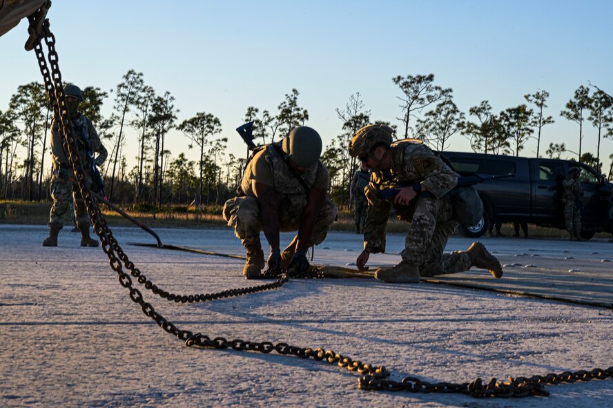 Airmen participate in bivouac training.