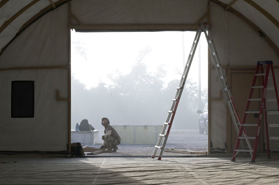 Airmen participate in bivouac training.